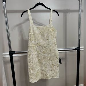 Short gold and white dress. Size small. New with tags.